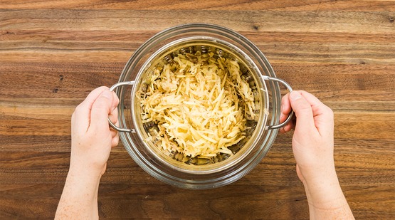 Grate the potatoes Grate the potatoes