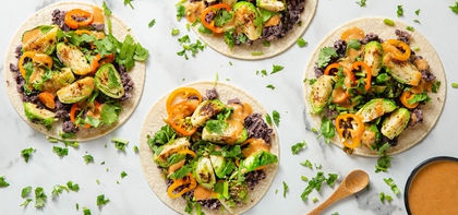 Charred Brussels Sprout Tacos with Spicy Peanut Dressing