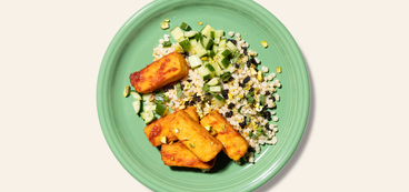 Crispy Harissa Tofu jeweled couscous, lemon-mint cucumbers