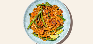 Peanut Pad Thai rice noodles, charred vegetables, lime