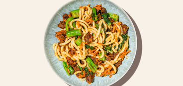 Seitan Yaki Udon tamari-peanut sauce, stir-fried carrots, gai lan
