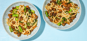 Yaki Udon seitan, stir-fried carrots & gai lan