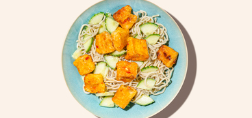 Sticky Tofu Ramen Noodles sweet chili sauce, tahini dressing, cucumber salad