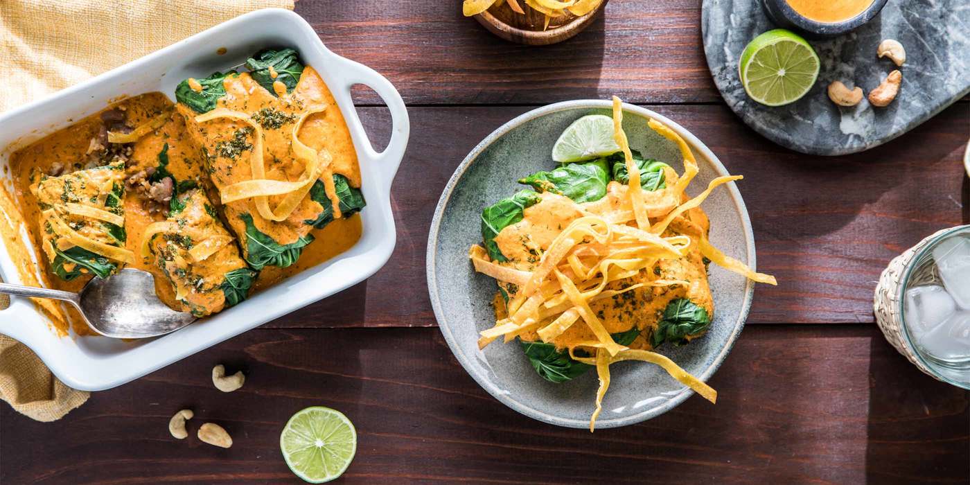 Collard Green Enchiladas with Spanish Rice and Creamy Red Pepper Sauce