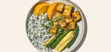 Orange Tofu quinoa-speckled rice, roasted zucchini