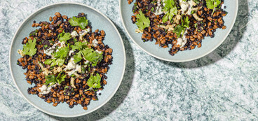 Mujadara-Style Farro beluga lentils, crispy dates, cilantro crema