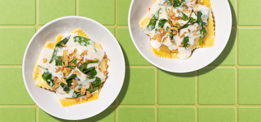 Artichoke-Mushroom Ravioli garlic-herb sauce, crispy onions