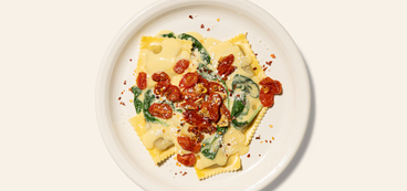 Sweet Corn Ravioli artichoke mushroom ravioli, roasted tomatoes