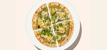 Salsa Verde Pizzas corn, zucchini, plant-based mozzarella