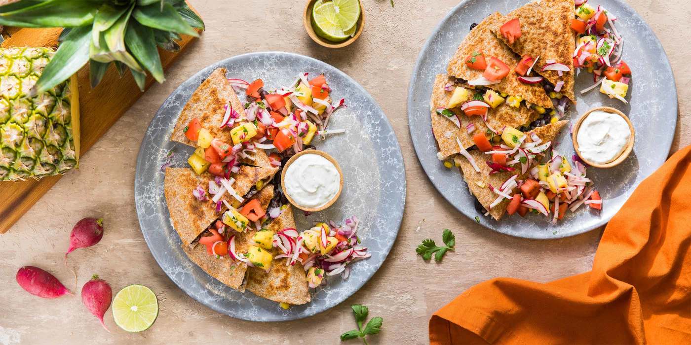 Black Bean and Corn Quesadilla with Pineapple Pico and Lime Crema