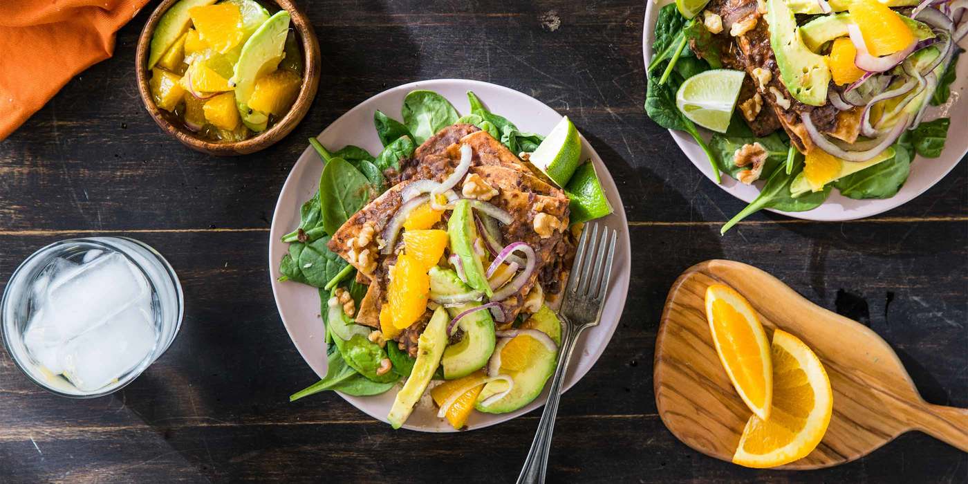 Mole Enfrijoladas with Walnuts & Citrus Avocado Salad