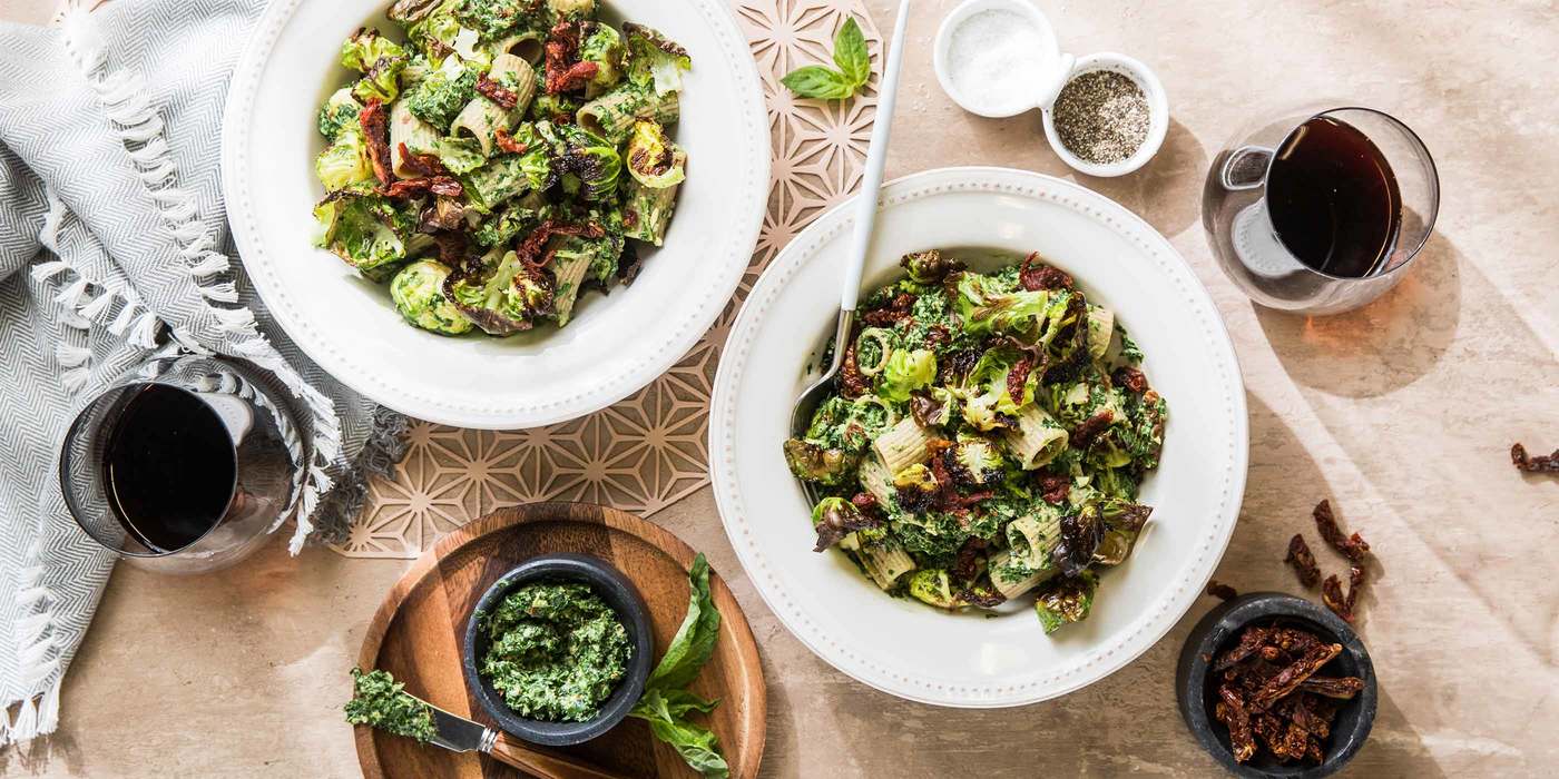 Pesto Rigatoni with Crispy Brussels Sprouts & Sun-dried Tomatoes