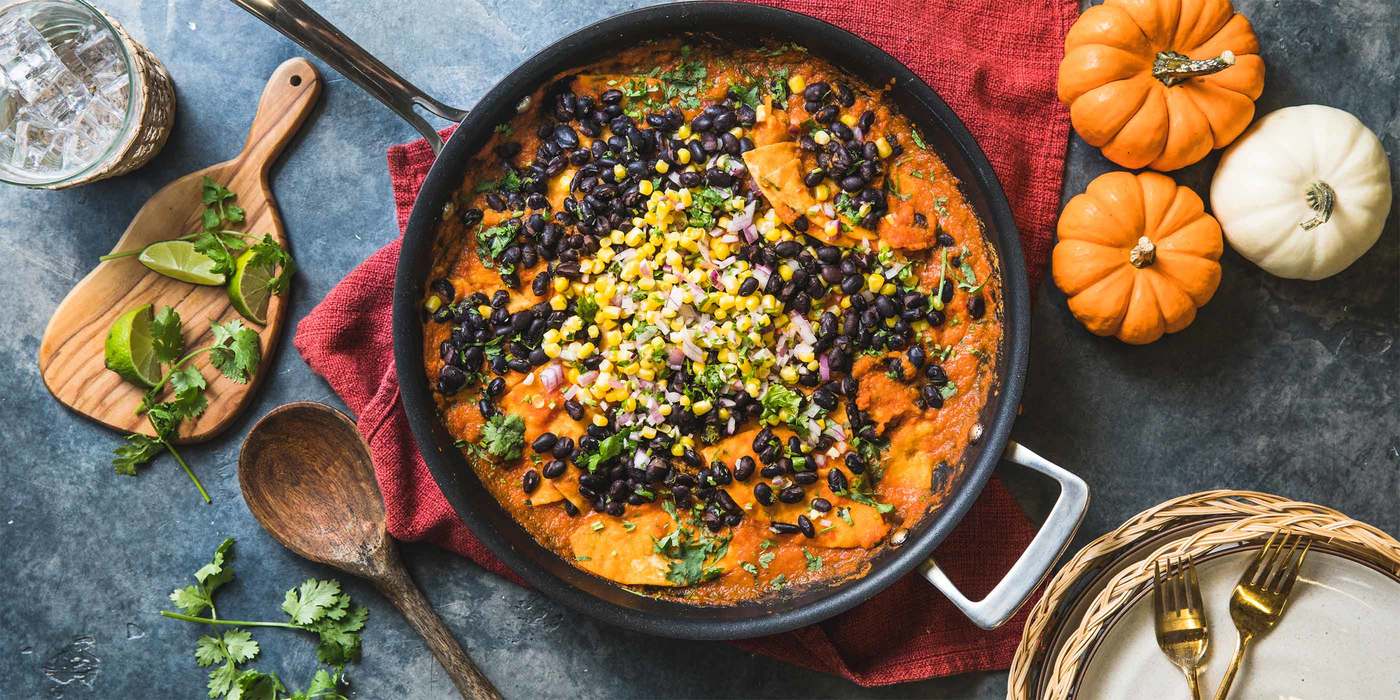 Chilaquiles in Pumpkin Salsa Roja with Zesty Black Beans & Corn