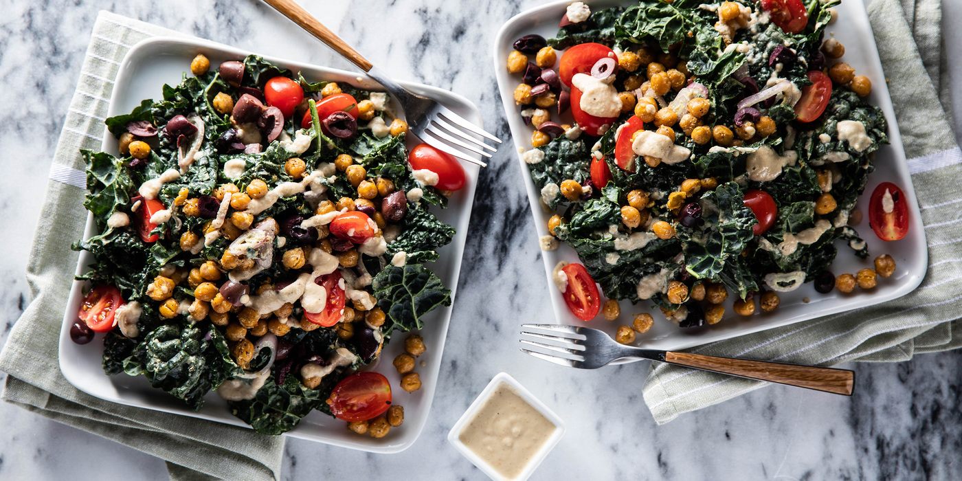 Loaded Kale Caesar with Crispy Chickpeas & Olive Tomato Salad