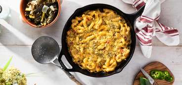 368 173 vegan southwest cheesy mac with pepita parmesan collard greens hero 1