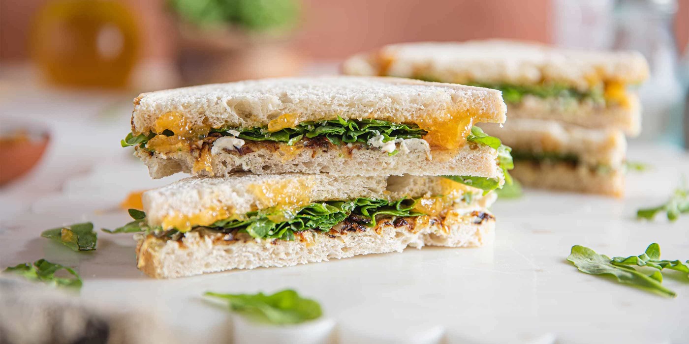 1400 700 vegan cashew cheese apricot melts with caramelized onions arugula horizontal
