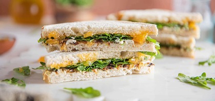 Cashew Cheese & Apricot Melts with Caramelized Onions & Arugula