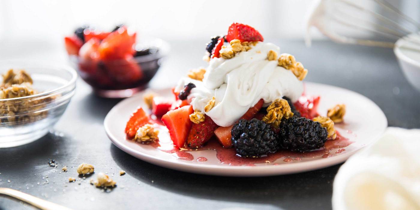 Macerated Berries with Coconut Whipped Cream and Granola