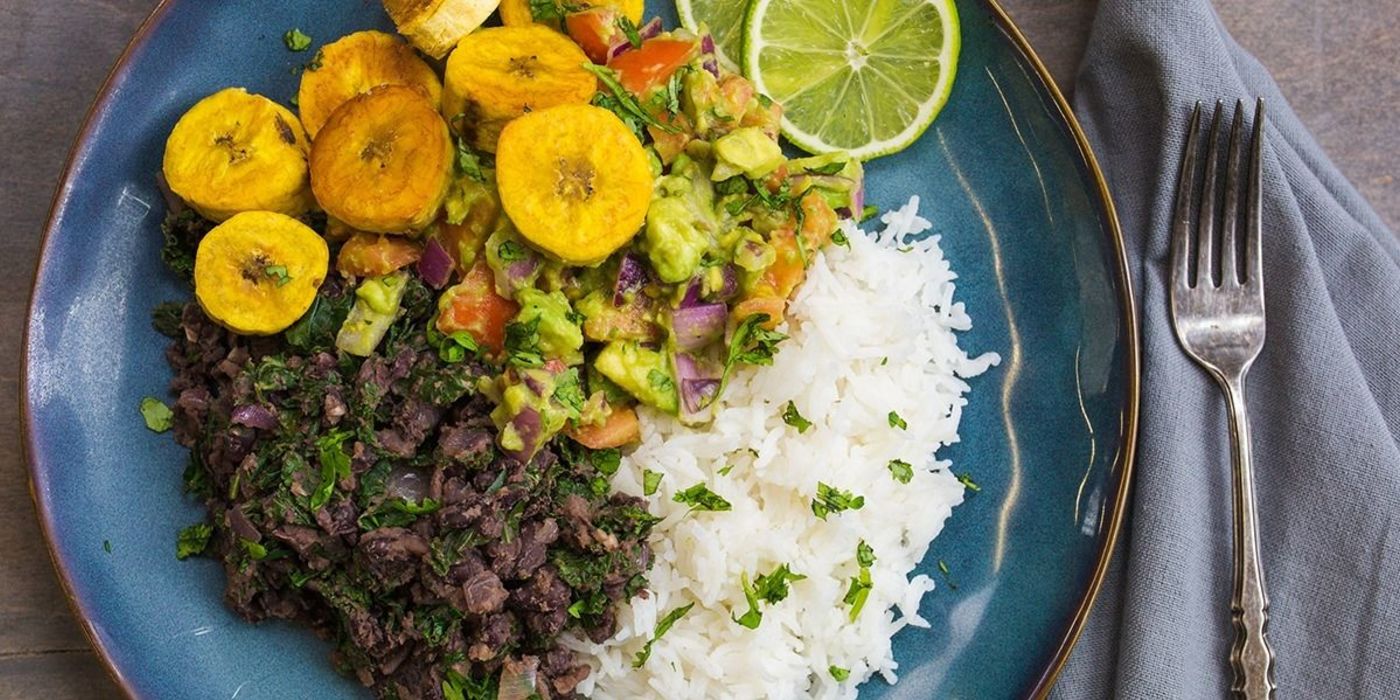 Black Bean and Kale Bowl with Roasted Plantains and Guacamole