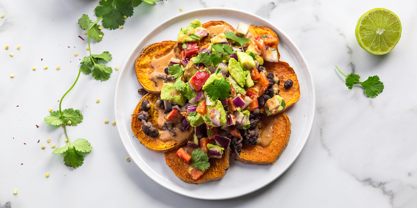 Loaded Sweet Potato Nachos with Avocado Salsa & Chipotle Crema