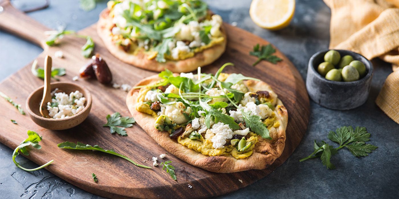 Curried Hummus Flatbread with Roasted Cauliflower & Olive Date Relish