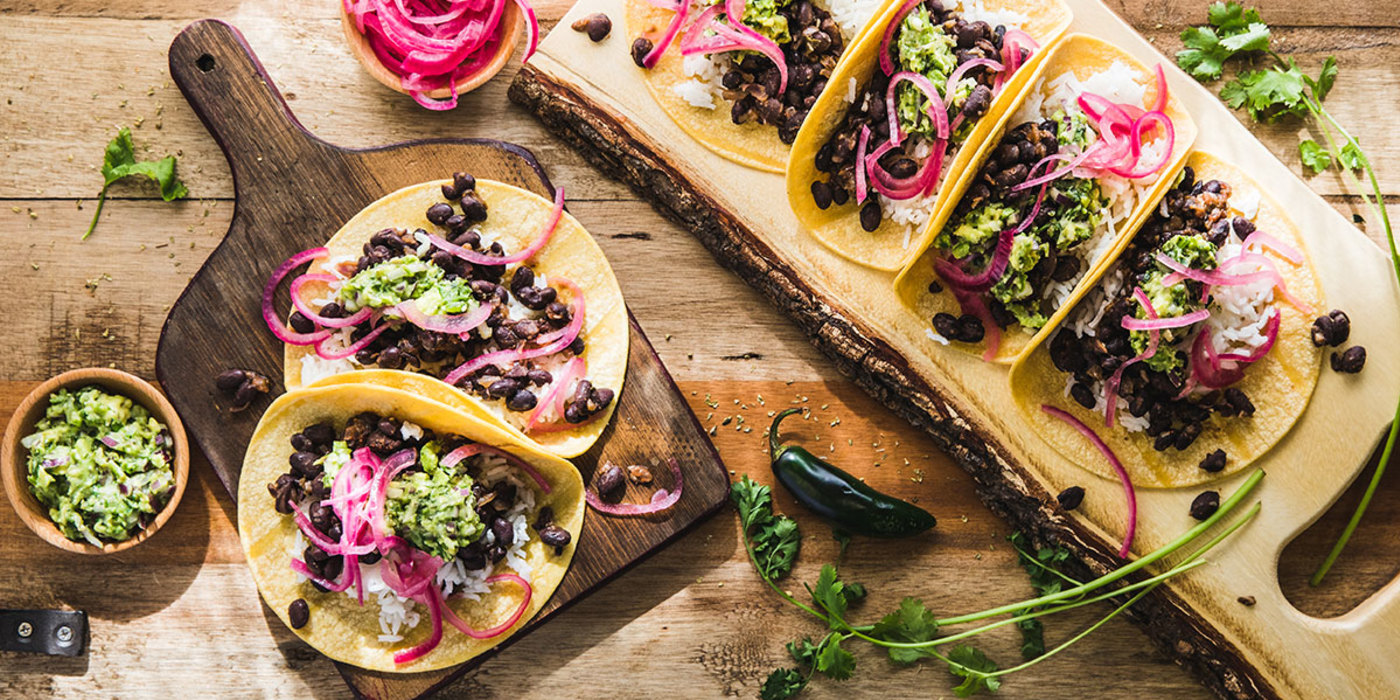 Cuban-Style Black Bean Tacos with Pickled Onions and Guacamole