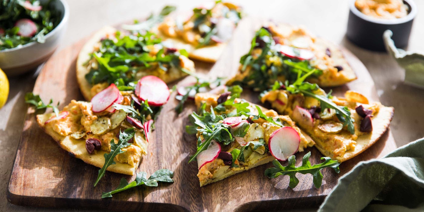 Socca Pizza with Carrot Parsnip Hummus and Garden Vegetables