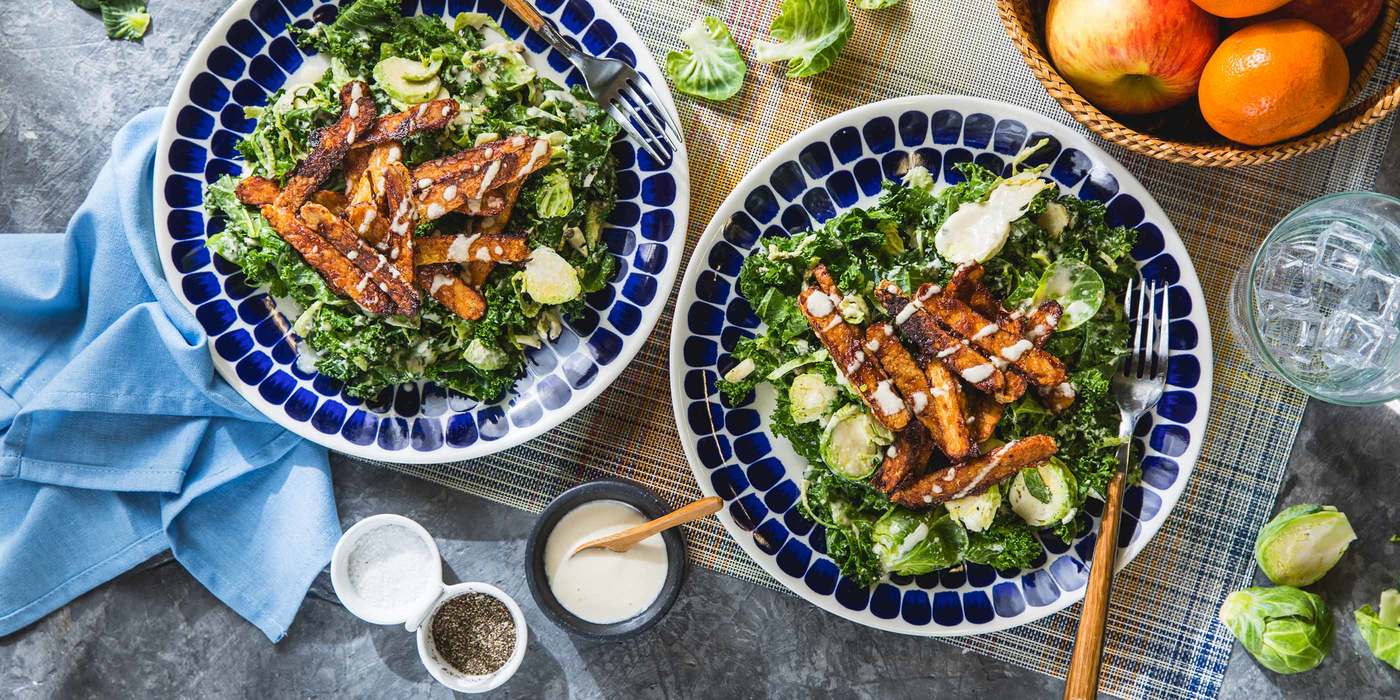 Kale Brussels Sprout Caesar Salad with BBQ Tempeh & Cashew Dressing Kale Brussels Sprout Caesar Salad with BBQ Tempeh & Cashew Dressing