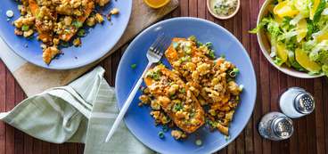 Loaded Sweet Potatoes with Charred Scallion Miso Butter & Five-Spice Tempeh