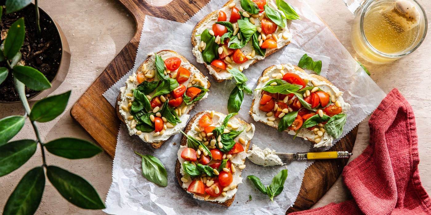 Creamy Cashew Cheese Toasts with Fresh Tomatoes & Pine Nuts Creamy Cashew Cheese Toasts with Fresh Tomatoes & Pine Nuts