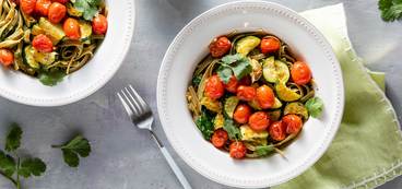 Cilantro Pepita Pesto Fettuccine with Roasted Zucchini & Cherry Tomatoes
