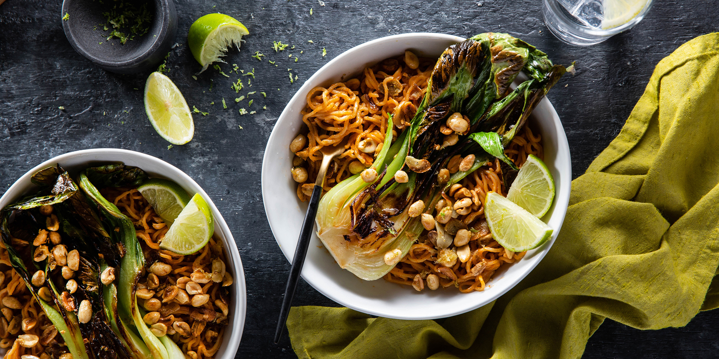 Red Curry Peanut Noodles with Crispy Bok Choy & Lime Garlic Nuts Red Curry Peanut Noodles with Crispy Bok Choy & Lime Garlic Nuts