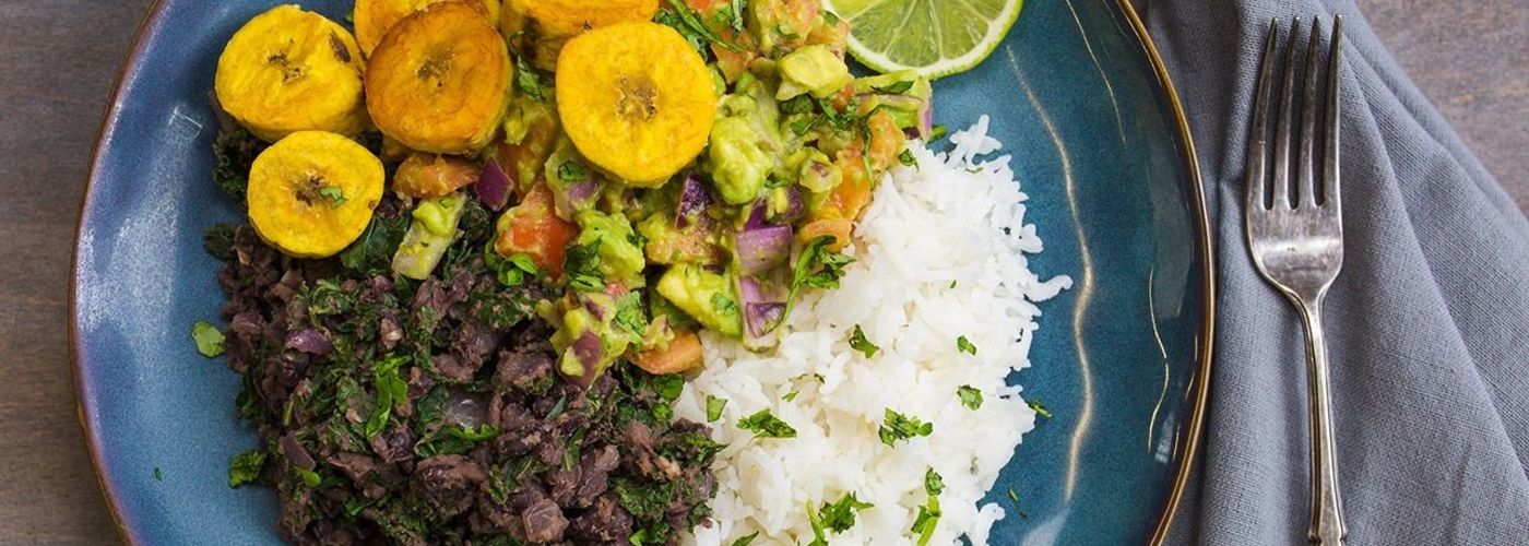 Black Bean and Kale Bowl with Roasted Plantains and Guacamole