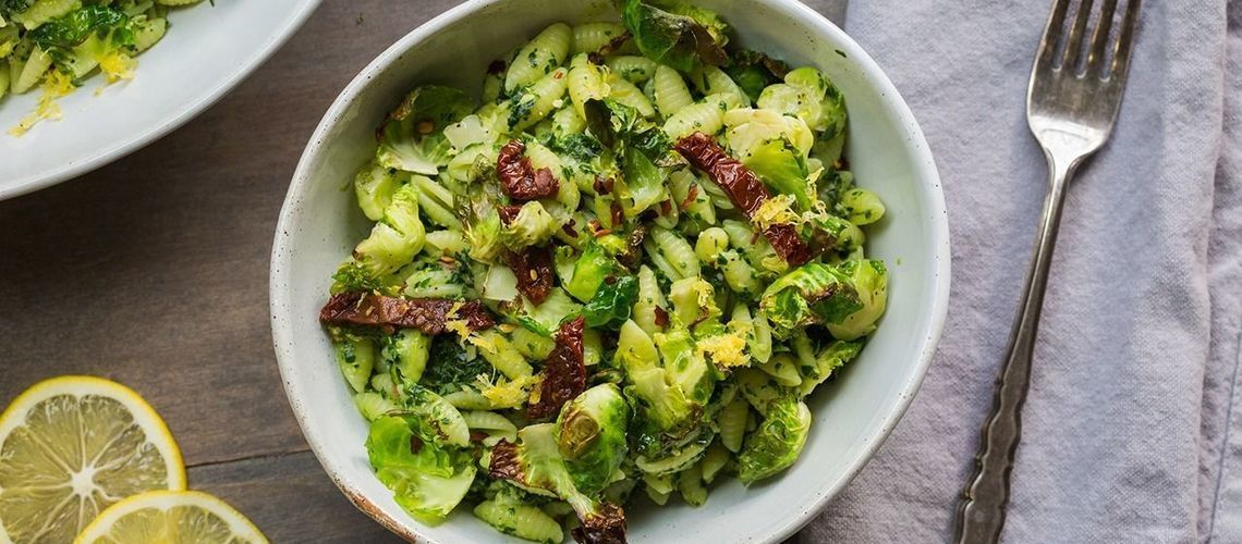 Kale Pesto Cavatelli with Crispy Brussels and Sundried Tomatoes image Kale Pesto Cavatelli with Crispy Brussels and Sundried Tomatoes image