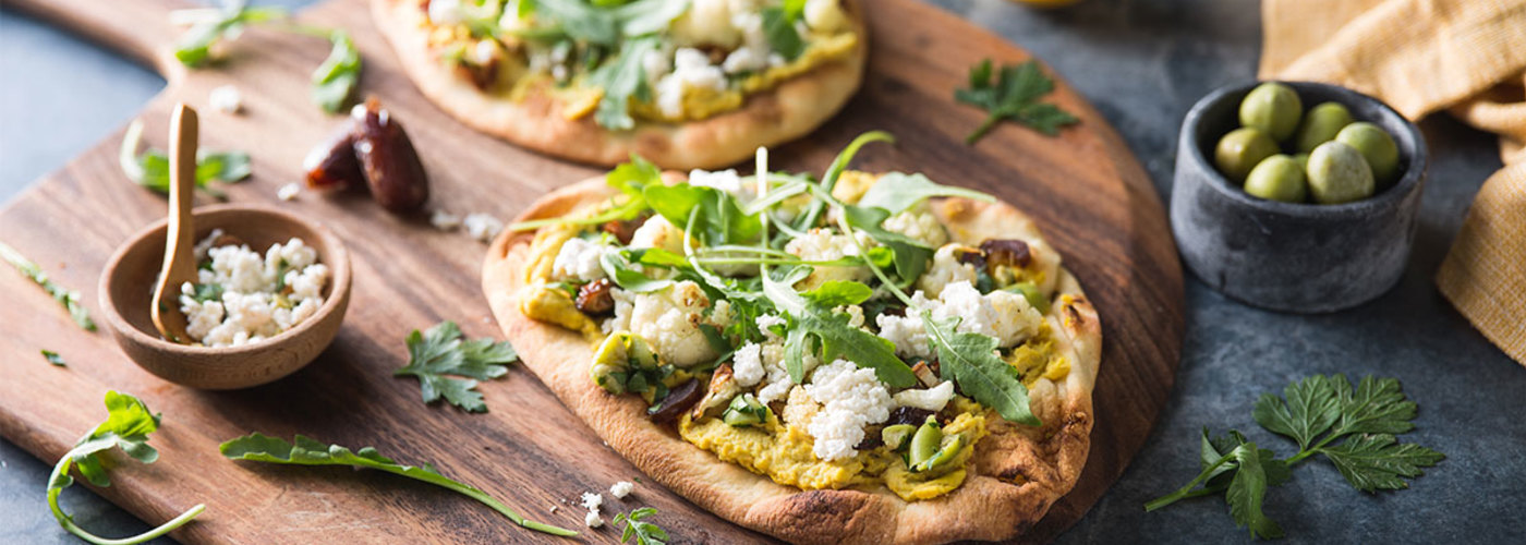Curried Hummus Flatbread with Roasted Cauliflower & Olive Date Relish
