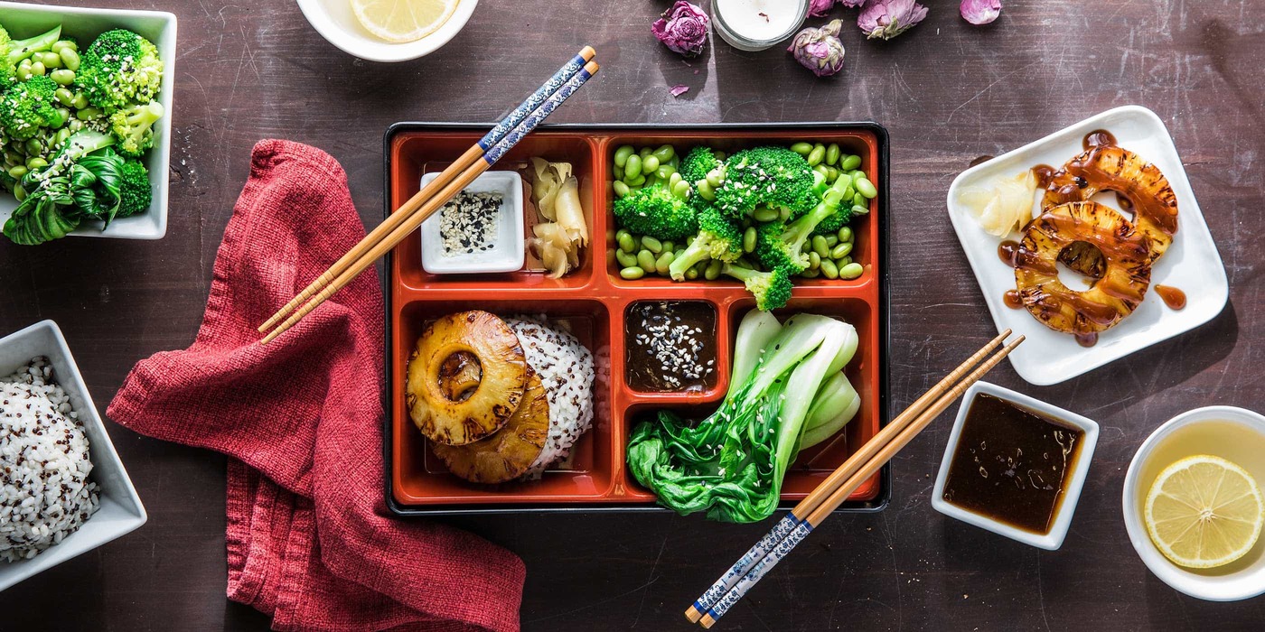 japanese-bento-box-with-teriyaki-pineapple-and-speckled-rice