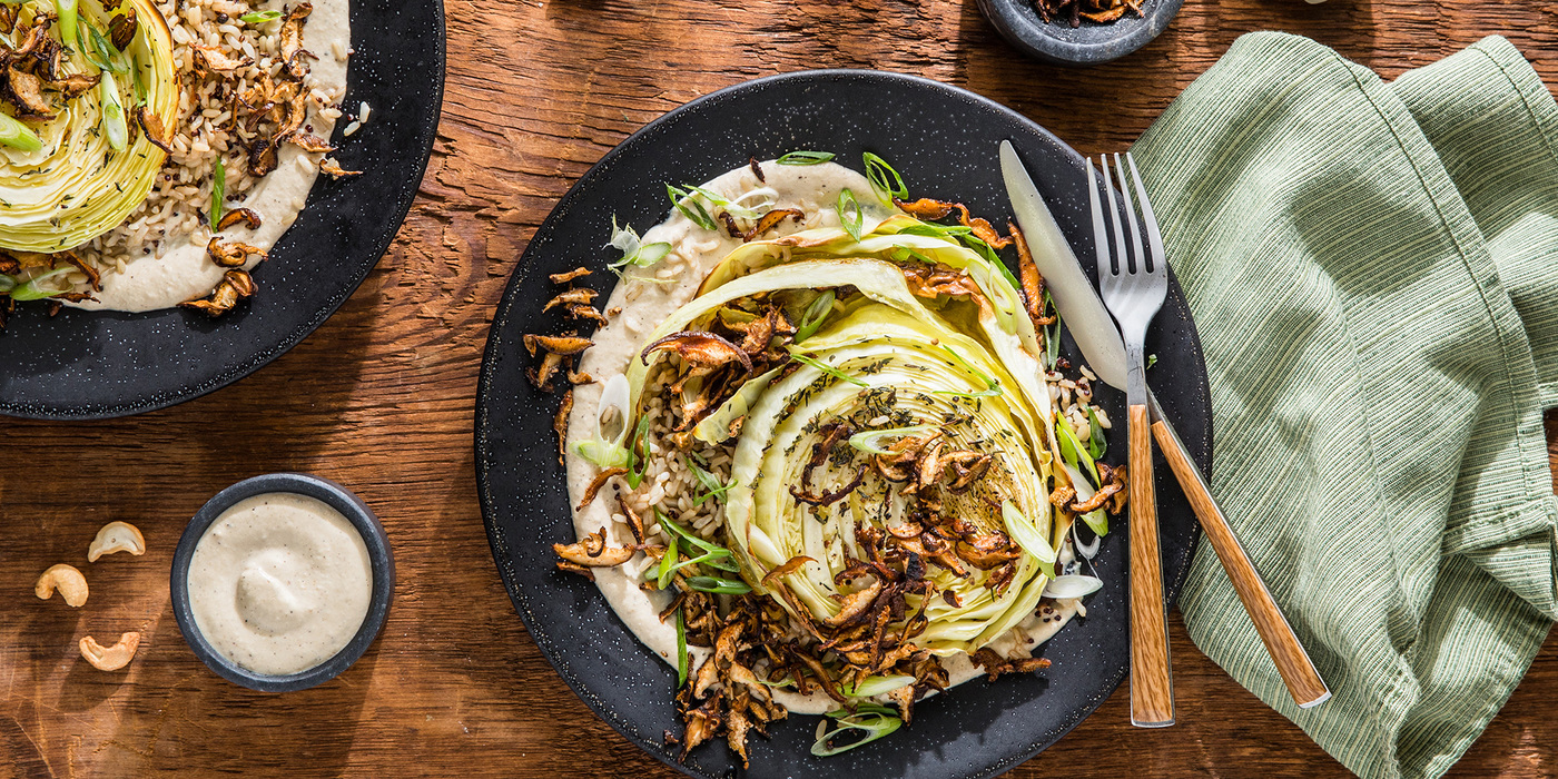 Roasted Cabbage Steaks with Shiitake Bacon and Garlic Cream Sauce Roasted Cabbage Steaks with Shiitake Bacon and Garlic Cream Sauce